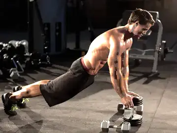 Correct form for the Close-Grip Push-Up off of a Dumbbell
