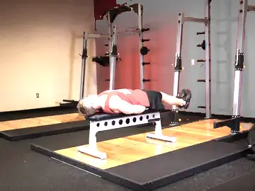 Correct form for the Flat Bench Lying Leg Raise