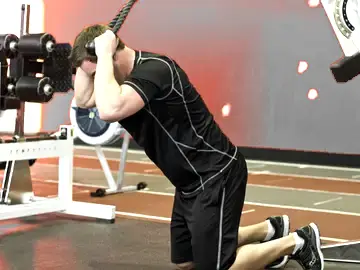 Correct form for the Kneeling Cable Crunch With Alternating Oblique Twists