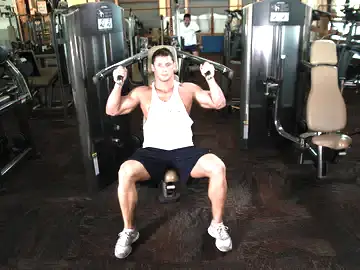 Correct form for the Machine Shoulder (Military) Press