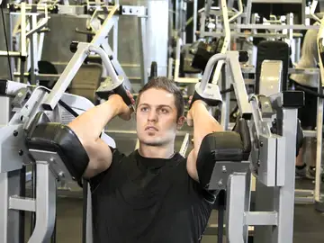 Correct form for the Machine Triceps Extension