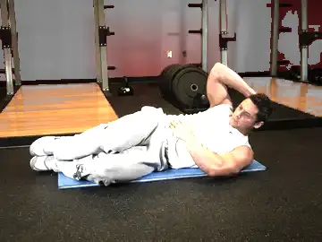 Correct form for the Oblique Crunches - On The Floor