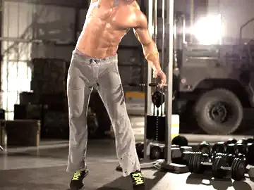 Correct form for the One-Arm Medicine Ball Slam