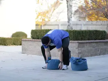 Correct form for the Sandbag Load