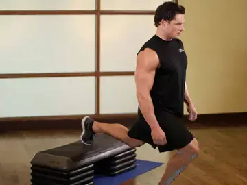 Correct form for the Standing Elevated Quad Stretch
