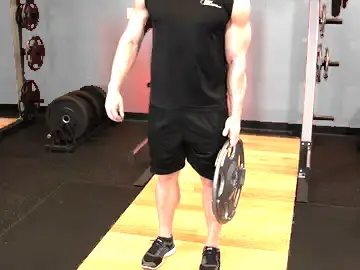 Correct form for the Standing Olympic Plate Hand Squeeze