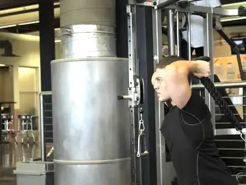 Correct form for the Triceps Overhead Extension with Rope
